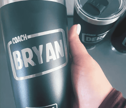 Personalized coach water tumbler with name Bryan, YETI brand, for sports or outdoor use.
